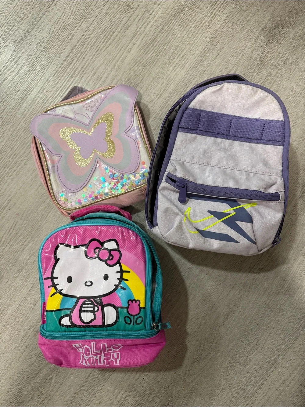 3 kids lunch bags - hello kitty - confetti butterfly and Nike